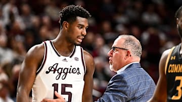 Nov 6, 2023; College Station, Texas, USA; Texas A&M Aggies head coach Buzz Williams speaks with Henry Coleman III during a time out in the second half against the Texas A&M Commerce at Reed Arena. Mandatory Credit: Maria Lysaker-Imagn Images