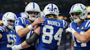 Indianapolis Colts tight end Tyler Warren (84) celebrates with his teammates after scoring a touchdown Sunday, Nov. 30, 2025, during a game against the Houston Texans at Lucas Oil Stadium in Indianapolis.