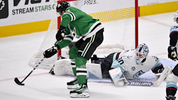 Nov 9, 2025; Dallas, Texas, USA; Dallas Stars center Tyler Seguin (91) scores a goal against Seattle Kraken goaltender Matt Murray (30) during the first period at the American Airlines Center. Mandatory Credit: Jerome Miron-Imagn Images