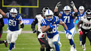 Nov 9, 2025; Berlin, Germany; Indianapolis Colts running back Jonathan Taylor (28) scores the winning touchdown in overtime against the Atlanta Falcons during the NFL Berlin Game at Olympic Stadium. Mandatory Credit: Kirby Lee-Imagn Images