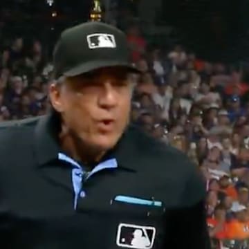 Home-plate umpire Phil Cuzzi didn't want to hear it from the Astros dugout. 