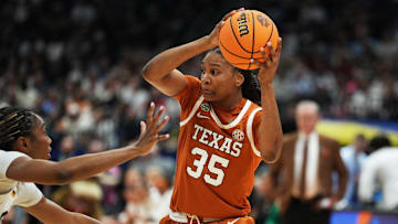 Texas Longhorns forward Madison Booker (35) looks for a way around defense from South Carolina Gamecocks during the NCAA semi-final game at Amalie Arena in Tampa, Florida, Friday April 4, 2025.