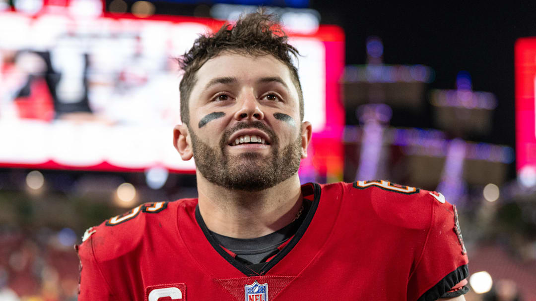 Dec 24, 2023; Tampa, Florida, USA; Tampa Bay Buccaneers quarterback Baker Mayfield (6) all smiles after the win against the Jacksonville Jaguars at Raymond James Stadium. Mandatory Credit: Jeremy Reper-Imagn Images