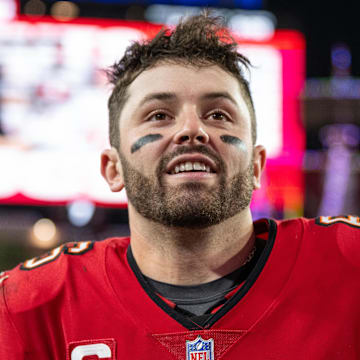 Dec 24, 2023; Tampa, Florida, USA; Tampa Bay Buccaneers quarterback Baker Mayfield (6) all smiles after the win against the Jacksonville Jaguars at Raymond James Stadium. Mandatory Credit: Jeremy Reper-Imagn Images