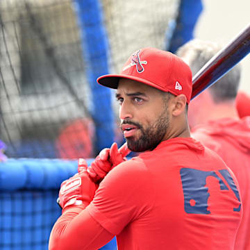 Dunedin, Florida, USA;St. Louis Cardinals shortstop Jose Fermin (15) prepares for batting practice before a spring training game against the Toronto Blue Jays at TD Ballpark.