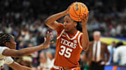 Texas Longhorns forward Madison Booker (35) looks for a way around defense from South Carolina Gamecocks during the NCAA semi-final game at Amalie Arena in Tampa, Florida, Friday April 4, 2025.