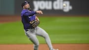 Jul 28, 2025; Cleveland, Ohio, USA; Colorado Rockies third baseman Kyle Farmer (6) throws to first base in the third inning against the Cleveland Guardians at Progressive Field. Mandatory Credit: David Richard-Imagn Images