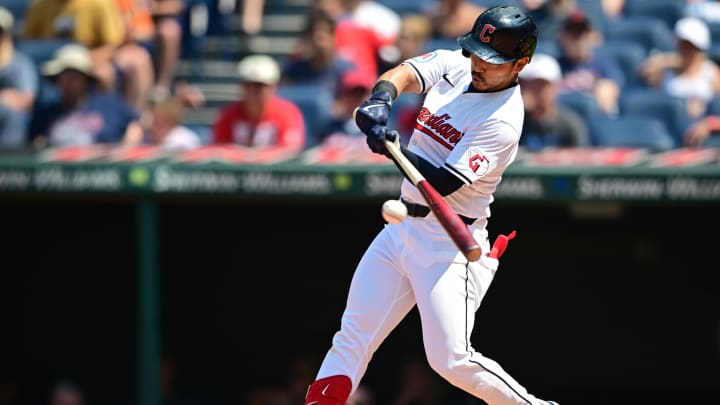 Aug 4, 2024; Cleveland, Ohio, USA; Cleveland Guardians left fielder Steven Kwan (38) hits an RBI single during the third inning against the Baltimore Orioles at Progressive Field. Mandatory Credit: David Dermer-USA TODAY Sports