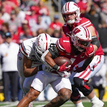 Wisconsin running back Chez Mellusi (1) rushes with the football during the second quarter against South Dakota at Camp Randall Stadium in Madison, Wis., on Sept. 7, 2024. 