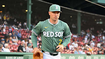 May 16, 2025; Boston, Massachusetts, USA; Boston Red Sox third baseman Alex Bregman (2) runs out of the dugout before the start of a game against the Atlanta Braves at Fenway Park. Mandatory Credit: Eric Canha-Imagn Images