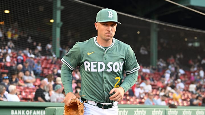May 16, 2025; Boston, Massachusetts, USA; Boston Red Sox third baseman Alex Bregman (2) runs out of the dugout before the start of a game against the Atlanta Braves at Fenway Park. Mandatory Credit: Eric Canha-Imagn Images
