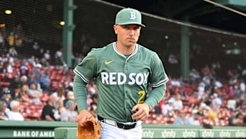 May 16, 2025; Boston, Massachusetts, USA; Boston Red Sox third baseman Alex Bregman (2) runs out of the dugout before the start of a game against the Atlanta Braves at Fenway Park. Mandatory Credit: Eric Canha-Imagn Images