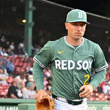 May 16, 2025; Boston, Massachusetts, USA; Boston Red Sox third baseman Alex Bregman (2) runs out of the dugout before the start of a game against the Atlanta Braves at Fenway Park. Mandatory Credit: Eric Canha-Imagn Images