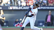Oct 1, 2025; Cleveland, Ohio, USA; Cleveland Guardians catcher Bo Naylor (23) hits a home run against the Detroit Tigers in the eighth inning during game two of the Wildcard round for the 2025 MLB playoffs at Progressive Field. Mandatory Credit: Ken Blaze-Imagn Images