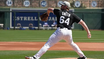 Mar 8, 2025; Phoenix, Arizona, USA; Chicago White Sox pitcher Shane Smith (64) throws against the Los Angeles Dodgers in the first inning at Camelback Ranch-Glendale. Mandatory Credit: Rick Scuteri-Imagn Images