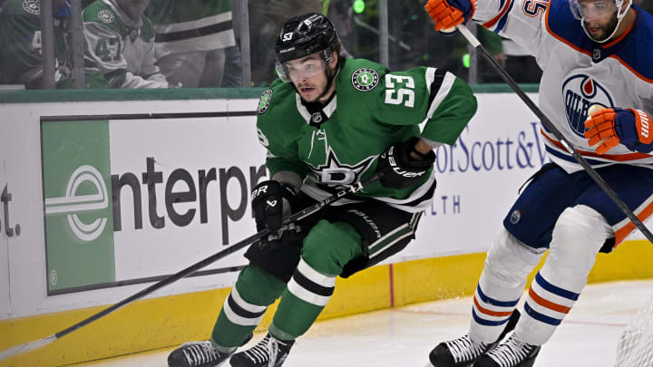 May 25, 2024; Dallas, Texas, USA; Dallas Stars center Wyatt Johnston (53) and Edmonton Oilers defenseman Darnell Nurse (25) in action during the game between the Dallas Stars and the Edmonton Oilers in game two of the Western Conference Final of the 2024 Stanley Cup Playoffs at American Airlines Center. Mandatory Credit: Jerome Miron-USA TODAY Sports