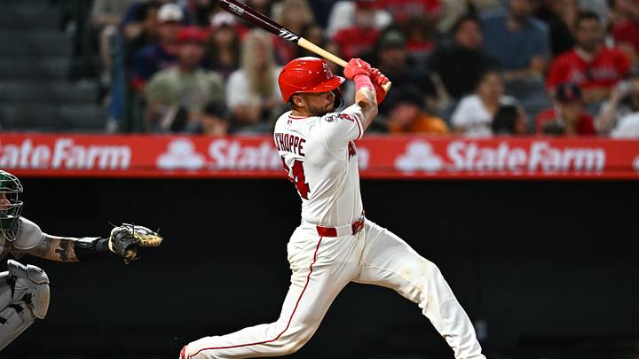 Jun 27, 2026; Anaheim, California, USA; Los Angeles Angels catcher Logan O'Hoppe (14) hits an RBI single during the eighth inning against the Athletics at Angel Stadium. Mandatory Credit: William Liang-Imagn Images