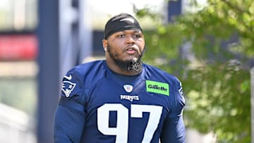 Jul 23, 2025; Foxborough, MA, USA; New England Patriots defensive end Milton Williams (97) walks to the practice field for training camp at Gillette Stadium. Mandatory Credit: Eric Canha-Imagn Images