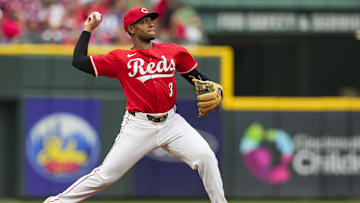 Jul 31, 2025; Cincinnati, OH, USA; Cincinnati Reds third baseman Ke'Bryan Hayes fields the ball and throws before the start of the game against the Atlanta Braves at Great American Ball Park. Mandatory Credit: Aaron Doster-Imagn Images