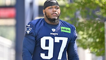 Jul 23, 2025; Foxborough, MA, USA; New England Patriots defensive end Milton Williams (97) walks to the practice field for training camp at Gillette Stadium. Mandatory Credit: Eric Canha-Imagn Images
