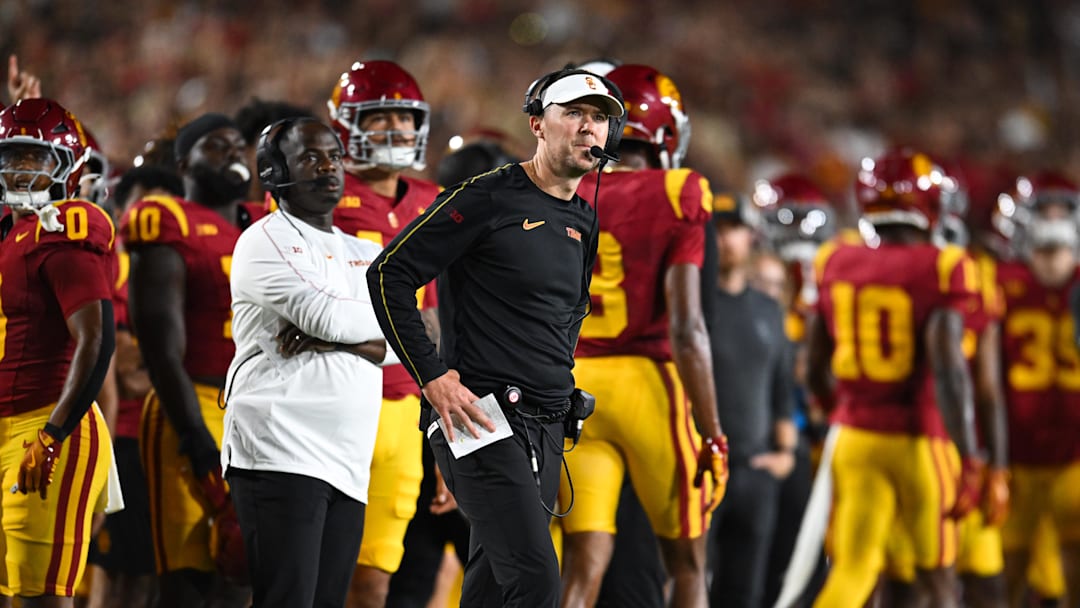 Sep 7, 2024; Los Angeles, California, USA; USC Trojans head coach Lincoln Riley reacts against the Utah State Aggies during the first quarter at United Airlines Field at Los Angeles Memorial Coliseum. Mandatory Credit: Jonathan Hui-Imagn Images