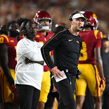 Sep 7, 2024; Los Angeles, California, USA; USC Trojans head coach Lincoln Riley reacts against the Utah State Aggies during the first quarter at United Airlines Field at Los Angeles Memorial Coliseum. Mandatory Credit: Jonathan Hui-Imagn Images