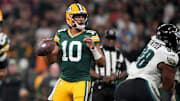 Green Bay Packers quarterback Jordan Love (10) drops to throw during the second half against the Philadelphia Eagles.