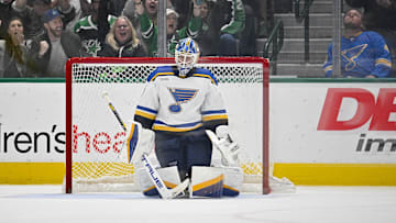 Apr 17, 2024; Dallas, Texas, USA; St. Louis Blues goaltender Jordan Binnington (50) reacts to giving up a goal to Dallas Stars left wing Jason Robertson (21)during the overtime shootout at the American Airlines Center. Mandatory Credit: Jerome Miron-Imagn Images