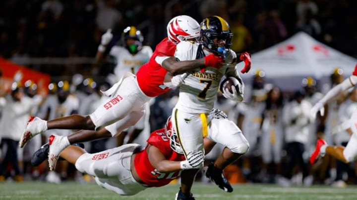 American Heritage running back Byron Louis against Milton on Friday night at St. Thomas Aquinas High School 