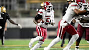 Nov 9, 2024; Nashville, Tennessee, USA;  South Carolina Gamecocks running back Raheim Sanders (5) runs the ball against the Vanderbilt Commodores during the second half at FirstBank Stadium. Mandatory Credit: Steve Roberts-Imagn Images
