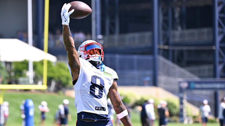 Jul 28, 2025; Foxborough, MA, USA; New England Patriots wide receiver Stefon Diggs (8) makes a one handed catch during training camp at Gillette Stadium. Mandatory Credit: Eric Canha-Imagn Images