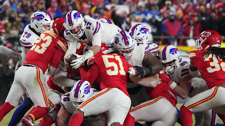Buffalo Bills quarterback Josh Allen (17) reaches for a first down against the Kansas City Chiefs during the second half in the AFC Championship game at GEHA Field at Arrowhead Stadium. Buffalo Bills quarterback Josh Allen (17) reaches for a first down against the Kansas City Chiefs during the second half in the AFC Championship game at GEHA Field at Arrowhead Stadium.