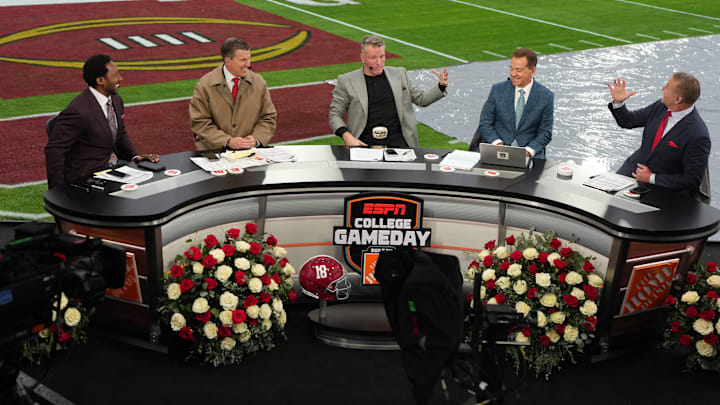 Jan 1, 2026; Pasadena, CA, USA; From left: Desmond Howard, Rece Davis, Pat McAfee, Nick Saban and Kirk Herbstreit on the ESPN College Gameday set during the 2026 Rose Bowl and quarterfinal game of the College Football Playoff at Rose Bowl Stadium. Mandatory Credit: Kirby Lee-Imagn Images