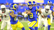 Dec 28, 2024; Inglewood, California, USA;   Los Angeles Rams quarterback Matthew Stafford (9) carries the ball to the 5-yard line in the first half against the Arizona Cardinals at SoFi Stadium. Mandatory Credit: Jayne Kamin-Oncea-Imagn Images