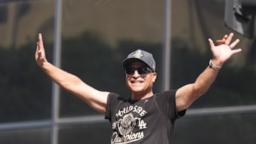 Nov 3, 2025; Los Angeles, CA, USA; Los Angeles Dodgers manager Dave Roberts waves to fans during the World Series championship parade and celebration. Mandatory Credit: Kirby Lee-Imagn Images
