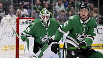 Oct 23, 2025; Dallas, Texas, USA; Dallas Stars goaltender Jake Oettinger (29) and defenseman Thomas Harley (55) faces the Los Angeles Kings attack during the first period at the American Airlines Center. Mandatory Credit: Jerome Miron-Imagn Images