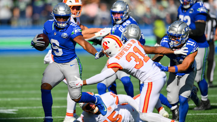 Oct 5, 2025; Seattle, Washington, USA; Seattle Seahawks running back Kenneth Walker III (9) carries the ball against the Tampa Bay Buccaneers during the second half at Lumen Field. Mandatory Credit: Steven Bisig-Imagn Images