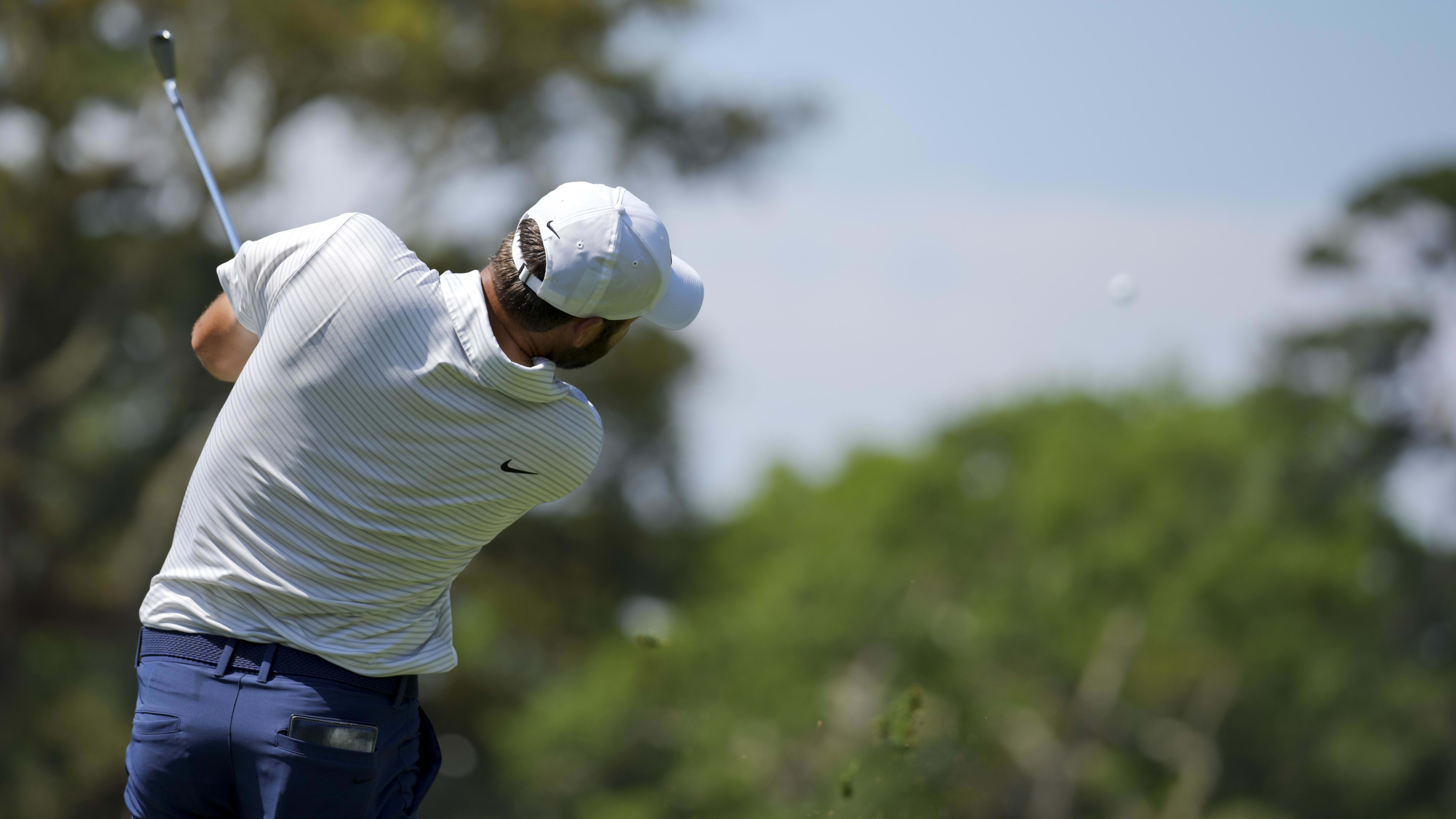 Scottie Scheffler plays his shot from the 7th tee in the first round of the 2024 RBC Heritage.