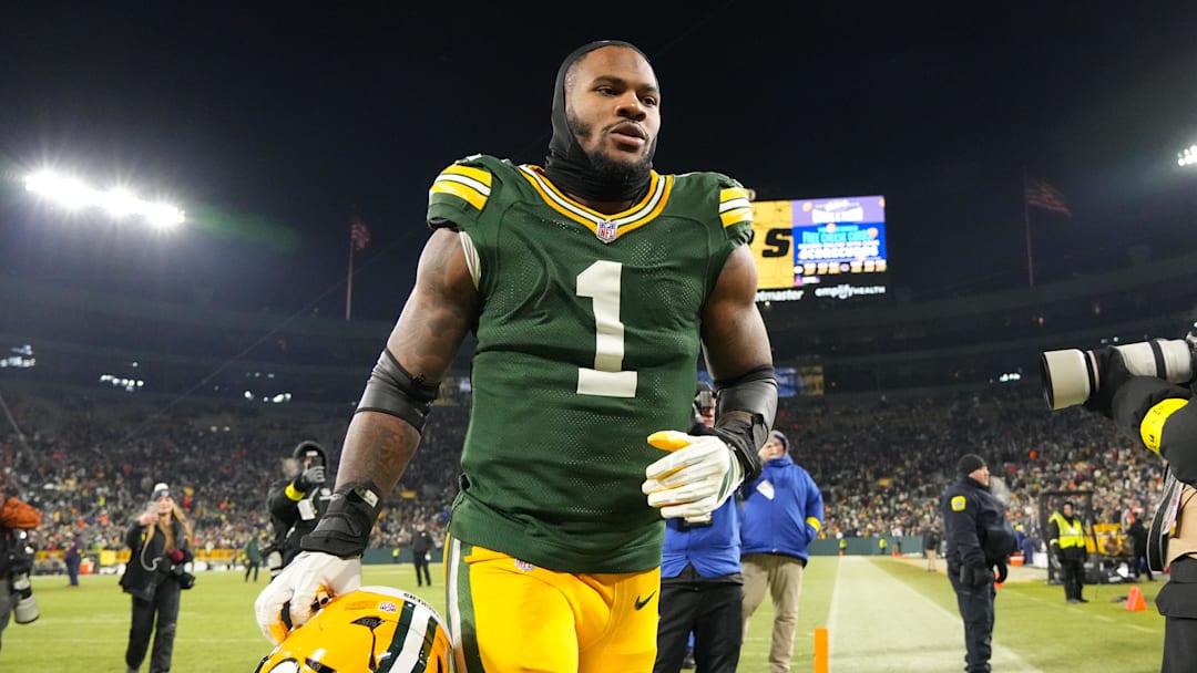 Dec 7, 2025; Green Bay, Wisconsin, USA;  Green Bay Packers defensive end Micah Parsons (1) jogs off the field following the game against the Chicago Bears at Lambeau Field. Mandatory Credit: Jeff Hanisch-Imagn Images
