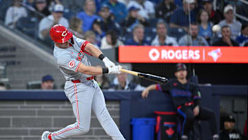 Aug 21, 2024; Toronto, Ontario, CAN;  Cincinnati Reds left fielder Spencer Steer (7) hits a two run home run against the Toronto Blue Jays in the fourth inning at Rogers Centre. Mandatory Credit: Dan Hamilton-Imagn Images