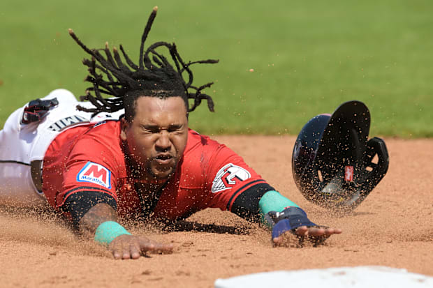 Jose Ramirez slides into base 