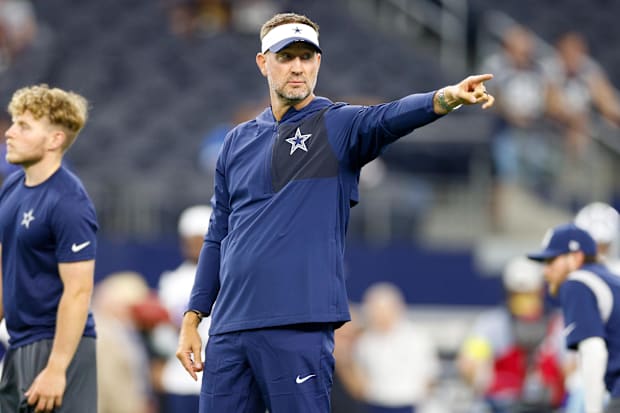 Dallas Cowboys head coach Brian Schottenheimer gives directions prior to the game against the Atlanta Falcons. 