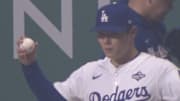 Yamamoto was warming up in the Dodger bullpen in the top of the 18th inning. 