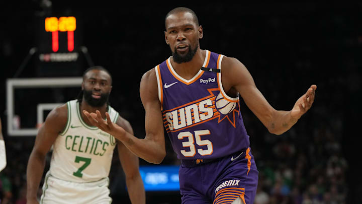 Mar 26, 2025; Phoenix, Arizona, USA; Phoenix Suns forward Kevin Durant (35) reacts after a foul call against the Boston Celtics during the first half at Footprint Center. Mandatory Credit: Rick Scuteri-Imagn Images