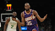 Mar 26, 2025; Phoenix, Arizona, USA; Phoenix Suns forward Kevin Durant (35) reacts after a foul call against the Boston Celtics during the first half at Footprint Center. Mandatory Credit: Rick Scuteri-Imagn Images