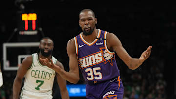 Mar 26, 2025; Phoenix, Arizona, USA; Phoenix Suns forward Kevin Durant (35) reacts after a foul call against the Boston Celtics during the first half at Footprint Center. Mandatory Credit: Rick Scuteri-Imagn Images