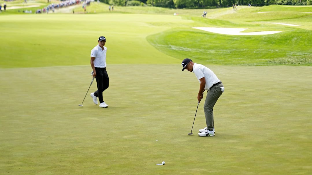 Xander Schauffele (putting) and Collin Morikawa will play together again in the final round of the PGA Championship.