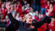 Jan 30, 2025; Lincoln, Nebraska, USA; Nebraska Cornhuskers volleyball head coach Dani Busboom Kelly is introduced during a break in the first half against the Illinois Fighting Illini at Pinnacle Bank Arena. Mandatory Credit: Dylan Widger-Imagn Images