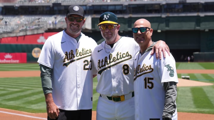 Jun 9, 2024; Oakland, California, USA; Oakland Athletics first base coach Bobby Crosby (8) poses for a photo with former pitchers Mark Mulder (20) and Tim Hudson (15) before the game against the Toronto Blue Jays at Oakland-Alameda County Coliseum. Mandatory Credit: Darren Yamashita-USA TODAY Sports