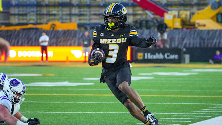 Aug 28, 2025; Columbia, Missouri, USA; Missouri Tigers wide receiver Kevin Coleman Jr. (3) runs the ball against the Central Arkansas Bears during the first half of the game at Faurot Field at Memorial Stadium. Mandatory Credit: Denny Medley-Imagn Images